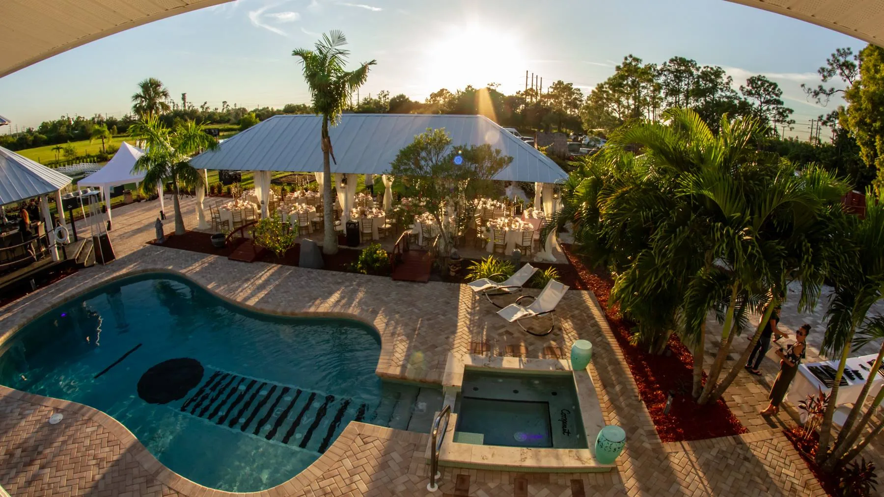 Haze Estate's guitar-shaped pool at sunset